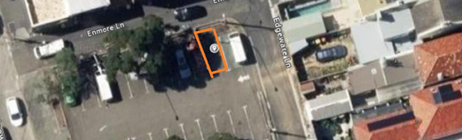 An aerial view of a parking lot

AI-generated content may be incorrect.