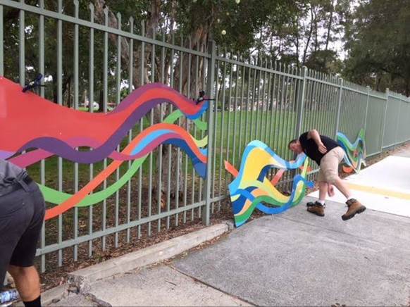 A person jumping over a fence

AI-generated content may be incorrect.
