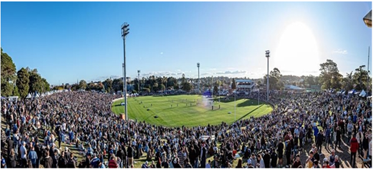 A large crowd of people on a field

AI-generated content may be incorrect.