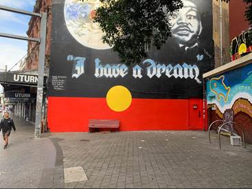 A wall painted on a building

AI-generated content may be incorrect.