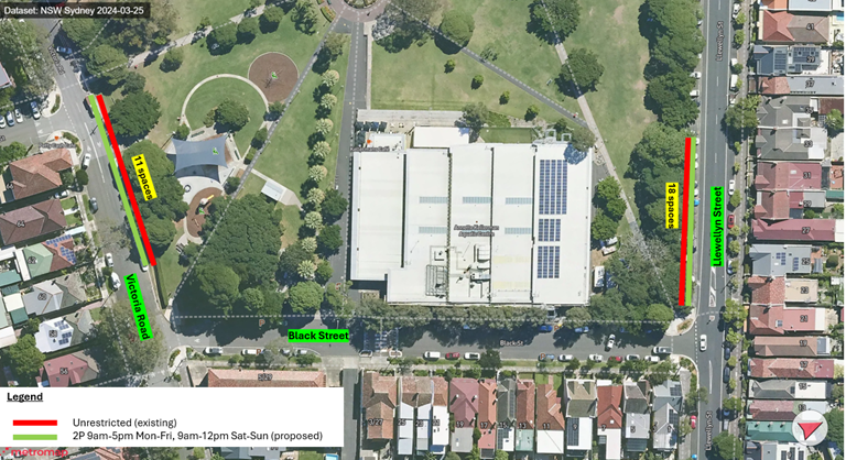 Aerial view of a building with a parking lot and trees
AI-generated content may be incorrect.