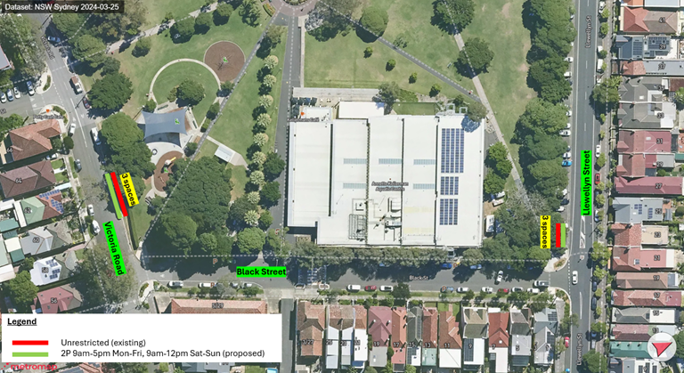 Aerial view of a building with trees and buildings
AI-generated content may be incorrect.