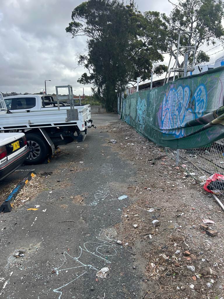 A truck parked next to a fence

AI-generated content may be incorrect.