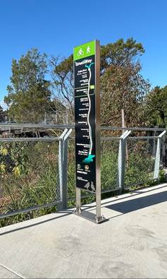 A sign on a sidewalk

AI-generated content may be incorrect.